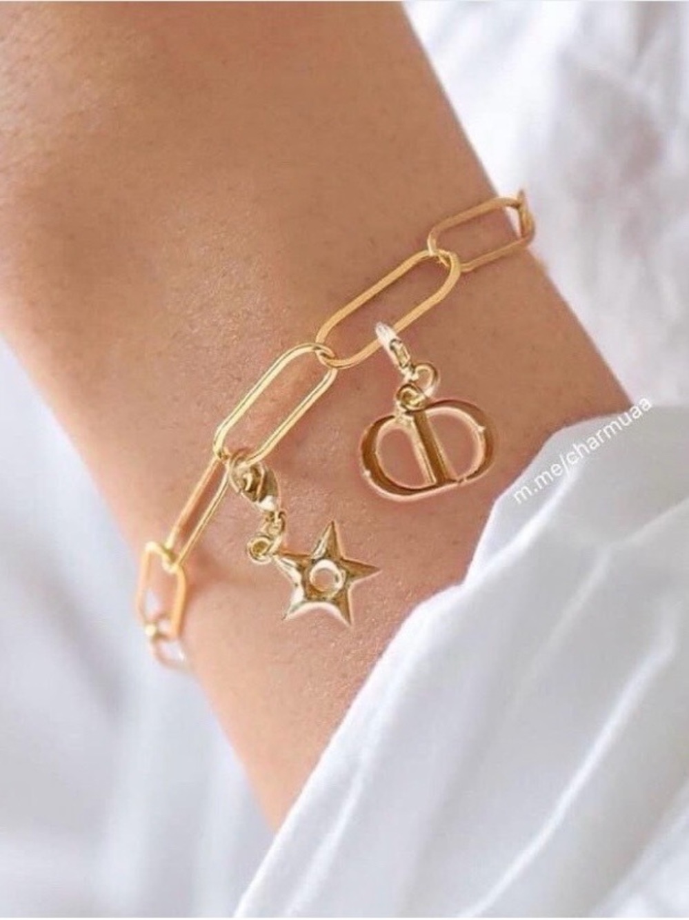 DIOR PHONE CHARM OR BRACELET.
